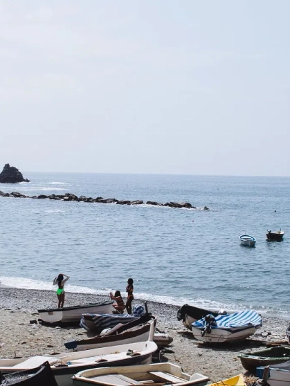 Dapoli Beach Experience Tourists walking along Dapoli beach shore